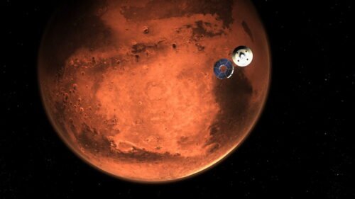 Quelle année marque le début de la conquête de la planête Mars avec une mission permettant de la prendre en photos ? 