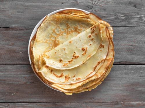 Quel agrume entre dans la composition de la crêpe Suzette ? 