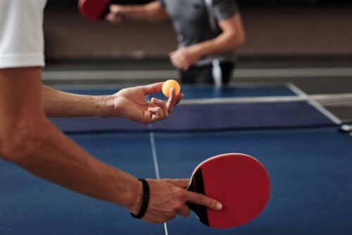 Au tennis de table, dans la règle classique, combien de points doit marquer un joueur au minimum pour remporter la partie ? 